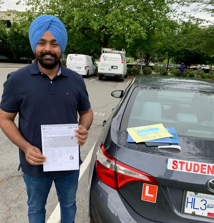 A Panorama student with his road test sheet